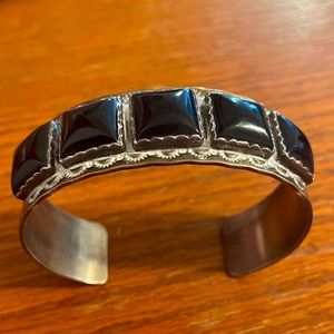 Sterling Silver Bracelet with black jewels.